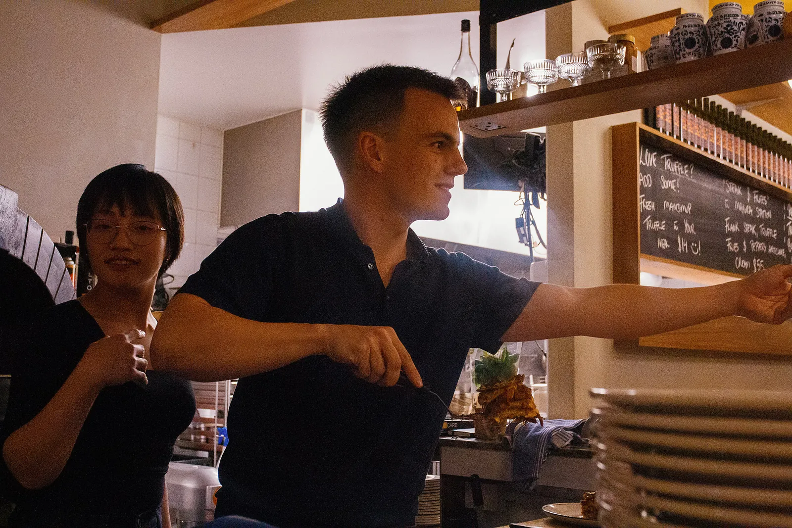 Alex cooking on the pass in a restaurant kitchen
