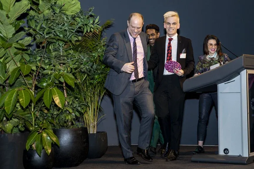 Alex on stage at the 2022 Premier's Sustainability Awards